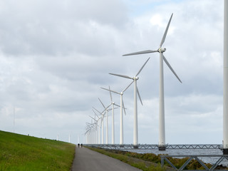 Windmills along the IJsselmeerdijk in Flevoland