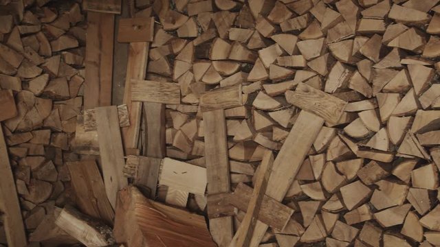Wood is neatly stacked in the shed close up movable 