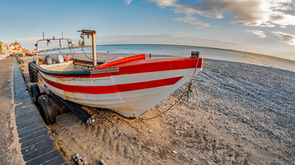 Fisheye view of traditional crab fishing boat on Cromer beach, Norfolk