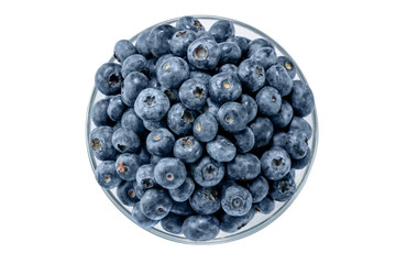 blueberries handful with water drops in glass transparent bowl background top view