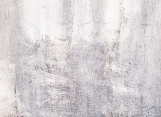 The gray concrete wall background has a rough texture. Grunge style design