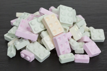 background of sweet sugar candy sticks with popping candy