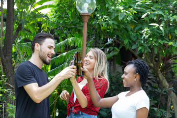 Obraz premium Group of friends having fun and happy in barbecue party at house backyard