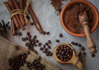 composition of coffee beans, shecolade, cinnamon and cocoa