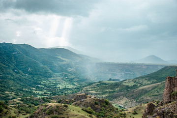 mountain landscape with dark clouds