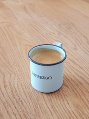 Espresso cup made on wooden table