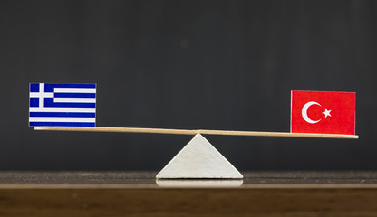 Turkey and Greece Flag Seesaw or Scale in Balance