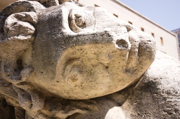 old granite statue face