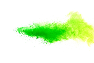 Green powder explosion isolated on white background. Abstract powder cloud.