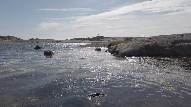 Smooth coastal landscape of barren stone at summer destination Bohuslan, Sweden