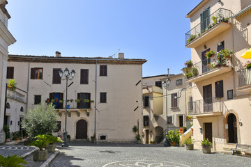 Fototapeta na wymiar A small square among the old houses of Giuliano di Roma, a rural village in the Lazio region.