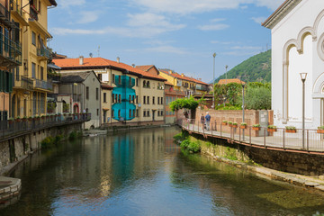 Fototapeta na wymiar View of the town of Omegna and the short river named Nigoglia