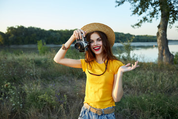 Cheerful woman red lips photographer camera nature fresh air