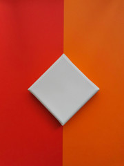 white clean flat cardboard on orange red background