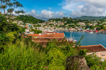 A view across the roof tops towards the inner harbour in St George in Grenada