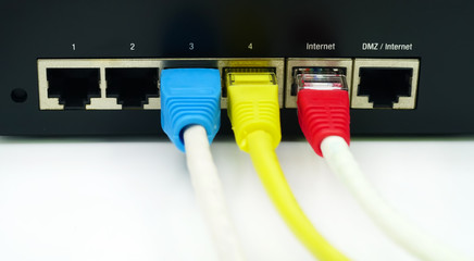 LAN network and internet connection, Ethernet RJ45 cable plug to lan port,modem router.Red, Yellow,...