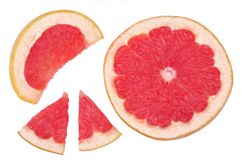 Slices of grapefruit isolated on the white background, flat lay, top view