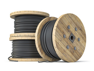Wire electric cable on wooden coil or spool isolated on white background.