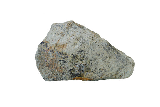 piece of gray shale rock isolated on a white background. Shale is a fine-grained sedimentary rock.