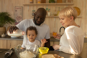 happy family having dinner, different nationalities