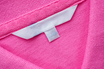 Blank white clothes label on new shirt