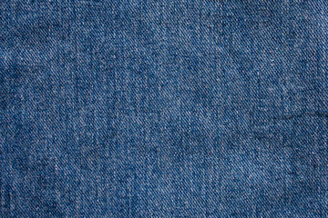 Fototapeta na wymiar Denim blue jeans texture close up background top view
