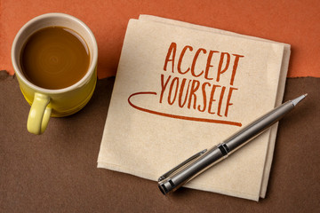 accept yourself inspirational reminder - handwriting on napkin with coffee, education and personal development concept