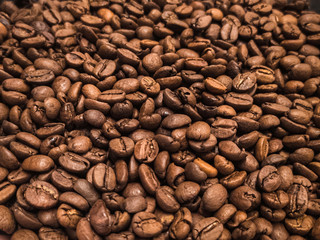 Background from roasted coffee beans. Aromatic Arabica coffee.
