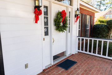 Residential home front door decorated for Christmas