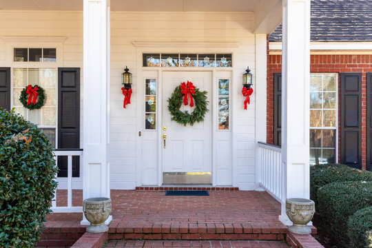 Residential home front door decorated for Christmas