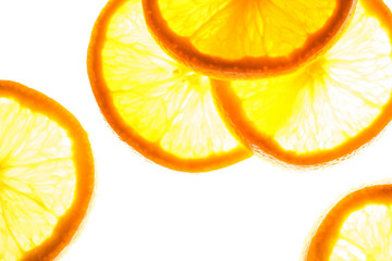 Close up group of orange slices with backlite. macro photo