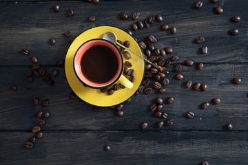 Coffee cup with roasted coffee beans