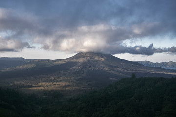 Obraz na płótnie Canvas high volcano with clouds on Bali island
