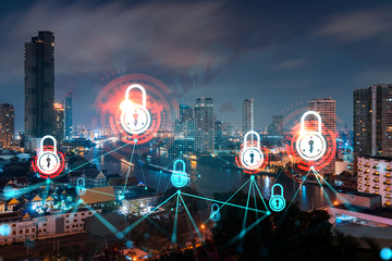 Glowing Padlock hologram, night panoramic city view of Bangkok, Asia. The concept of cyber security to protect companies. Double exposure.