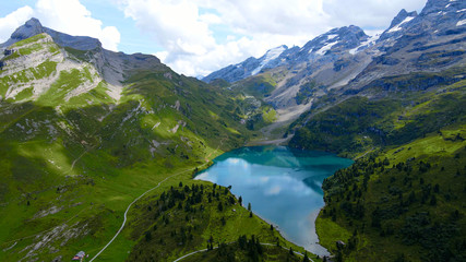 Naklejka na ściany i meble Landscape like a fairy tale - the Swiss Alps with its amazing nature - aerial view - travel photography