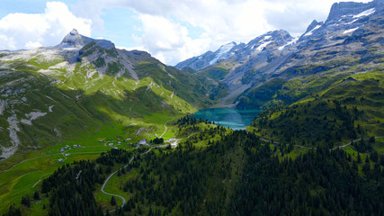 Naklejka premium Flight over the wonderful nature of Switzerland - the Swiss Alps from above - travel photography