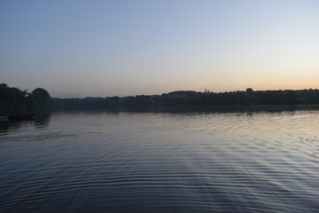 Obraz premium sunset over the river