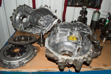 The disassembled manual transmission is on the table
