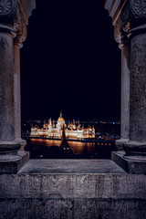 Fototapeta na wymiar The Budapest Parliament between two Pillars