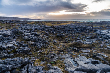 Obraz premium Karst landscape of the Burren at sunset, Ireland