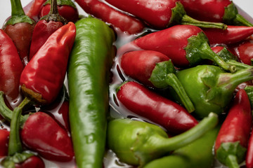 Group of Red hot chilli peppers close-up on a dark backgroundм