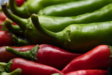 Group of Red hot chilli peppers close-up on a dark backgroundм