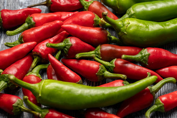 Group of Red hot chilli peppers close-up on a dark backgroundм