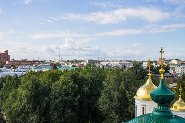 Fototapeta na wymiar top view of the old city on a summer day against a cloudy blue sky in Yaroslavl Russia