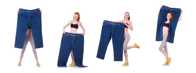 Woman with large jeans in dieting concept
