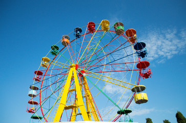 multi-colored ferris wheel.  recreation and entertainment