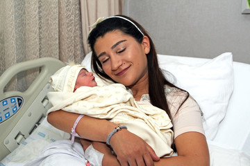 Newborn baby and mother