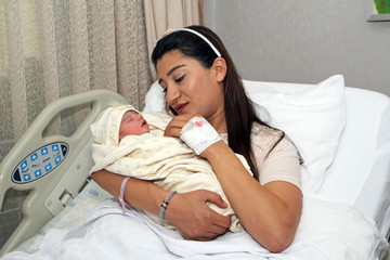 Newborn baby and mother