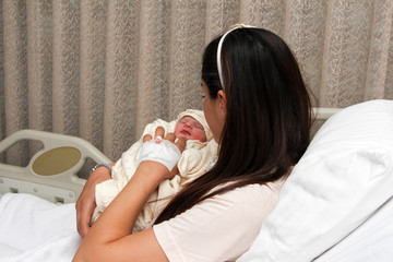 Newborn baby and mother