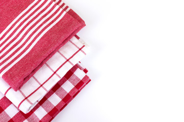 Red checkered gingham kitchen towels top view on white with copy space